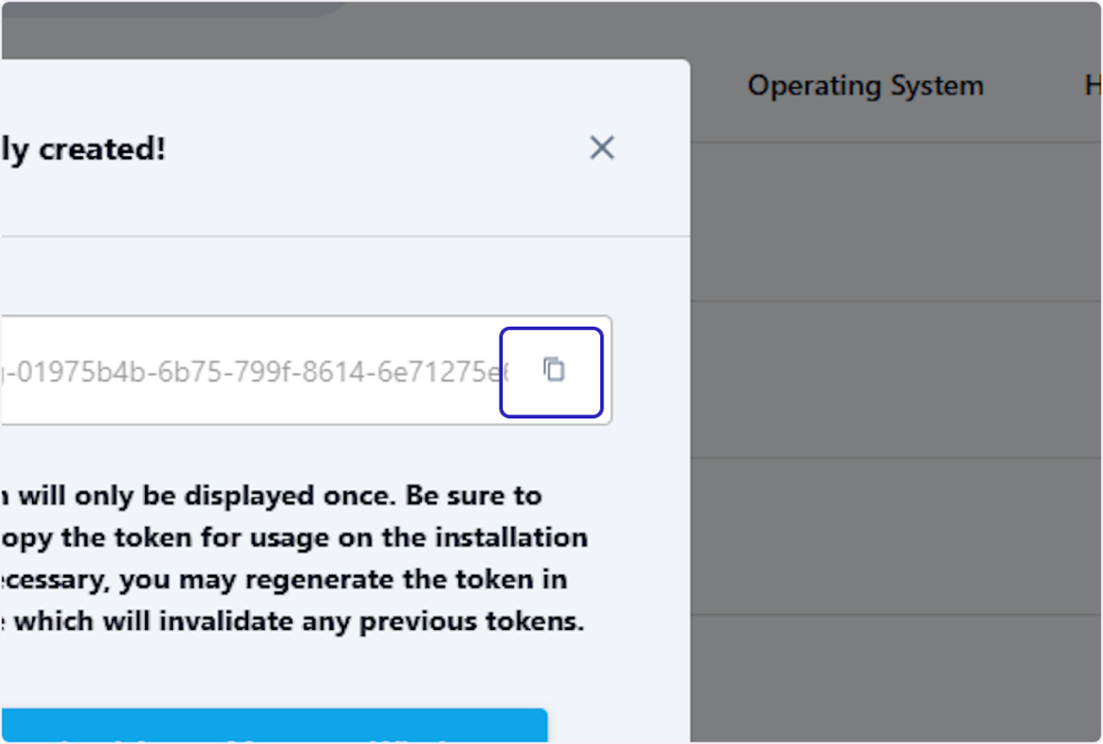 The newly created agent showing the one-time registration token with a copy button